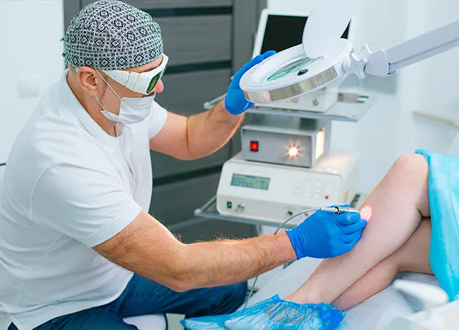 doctor working on persons veins